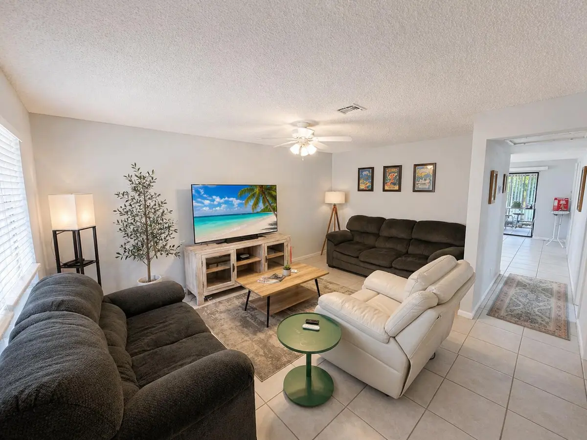 Living room at 9262 Green Meadows Way, Palm Beach Gardens
