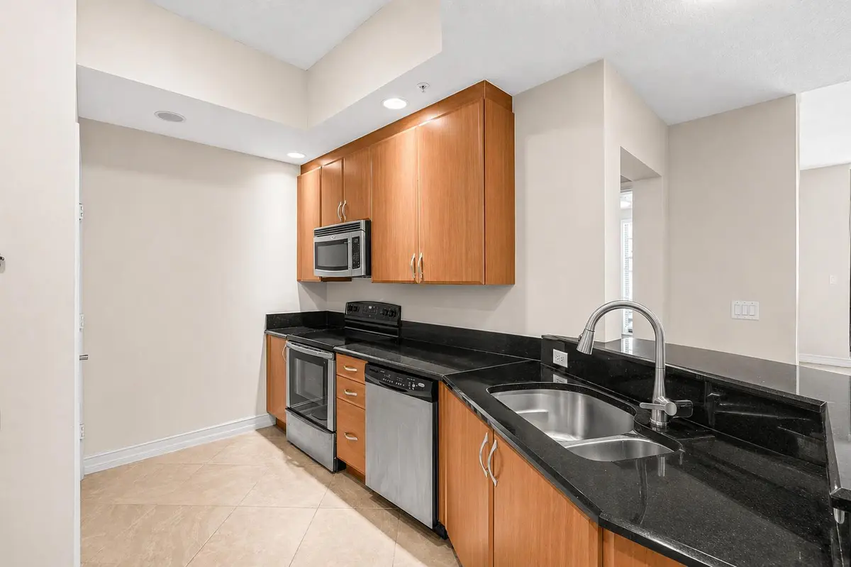 Kitchen w/ Ample Storage & Counters at 701 S Olive Avenue 1213, West Palm Beach
