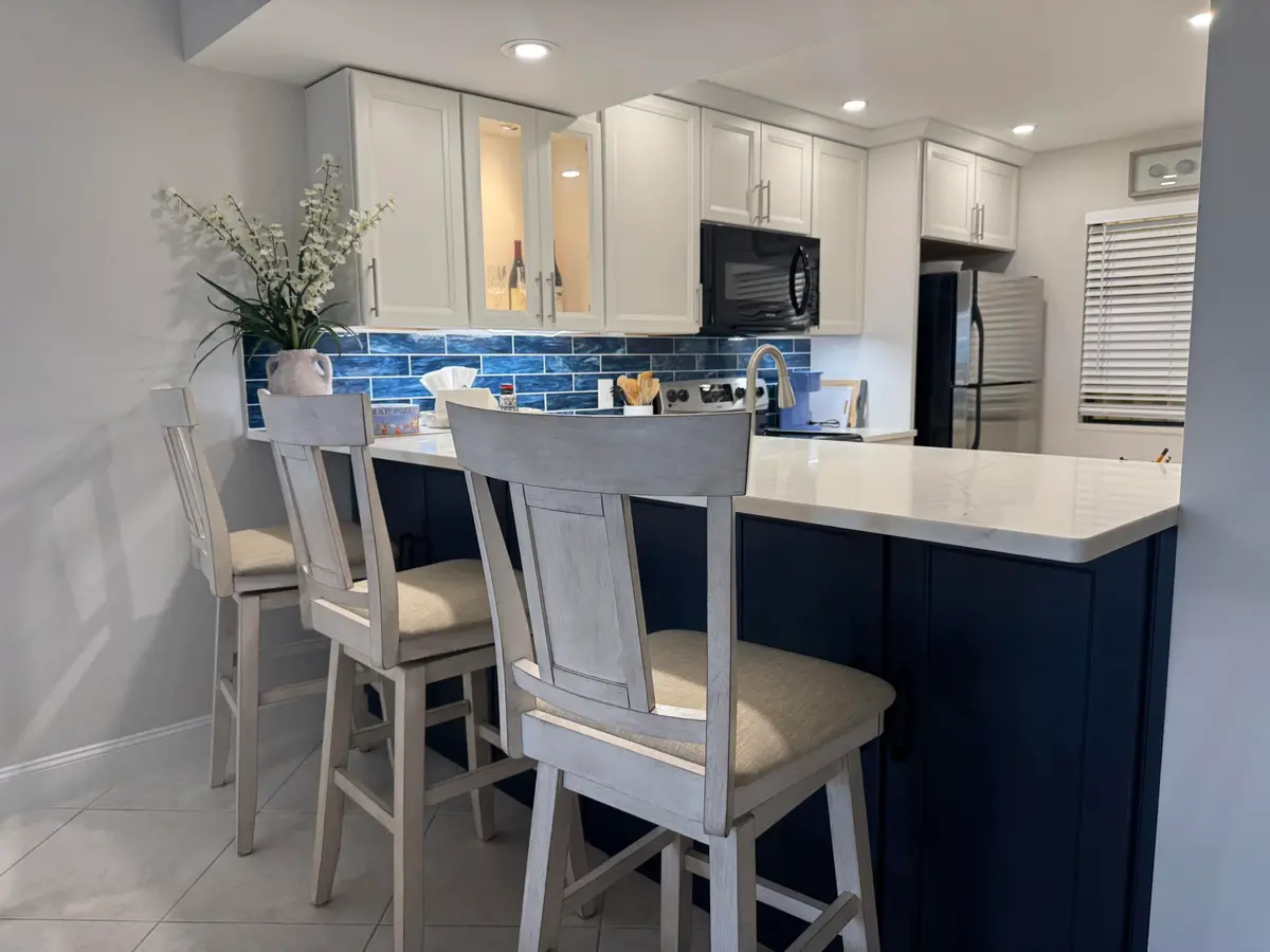 Kitchen Area at 401 Ocean Bluffs Boulevard 303, Jupiter