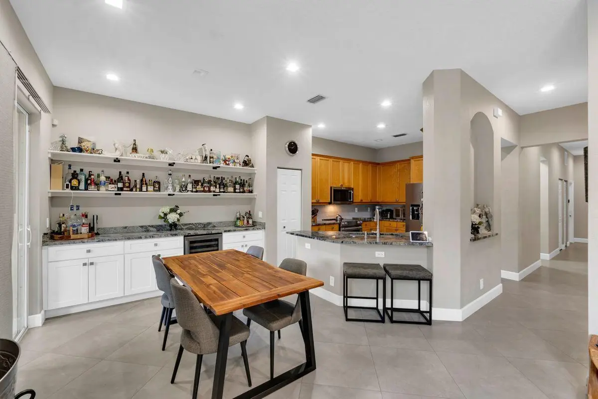 Dining area with Custom Bar at 5812 NW 119th Terrace, Coral Springs