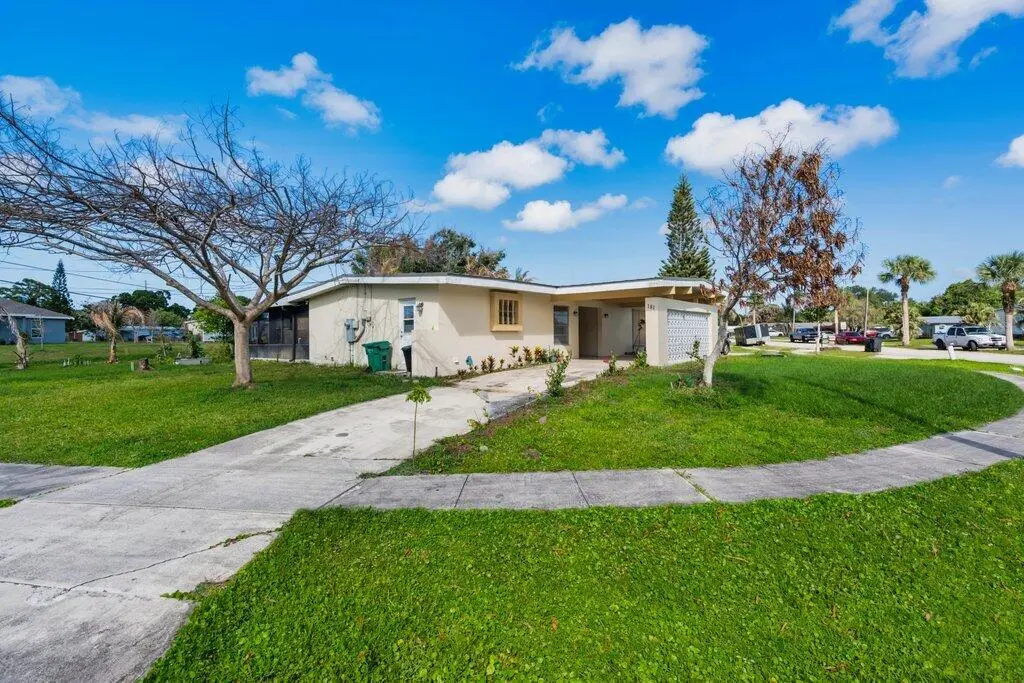Front Extertior R.jpeg-SMALL at 181 Banyan Drive, Port St. Lucie