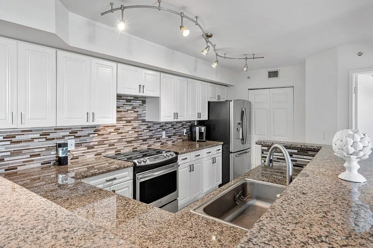 HBC 406 Kitchen Laundry Room at 3594 S Ocean Boulevard 406, Highland Beach