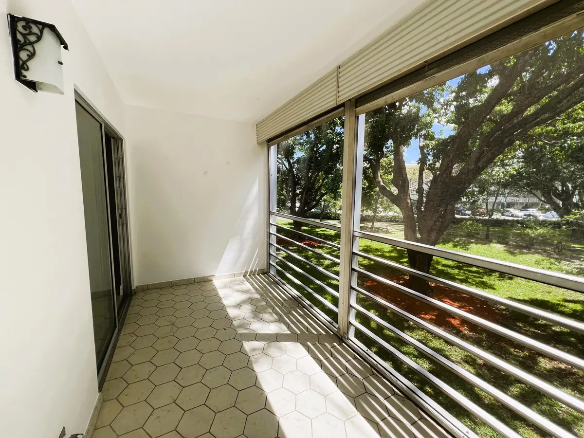 Garden/Pool View at 3001 Portofino Isle E2, Coconut Creek