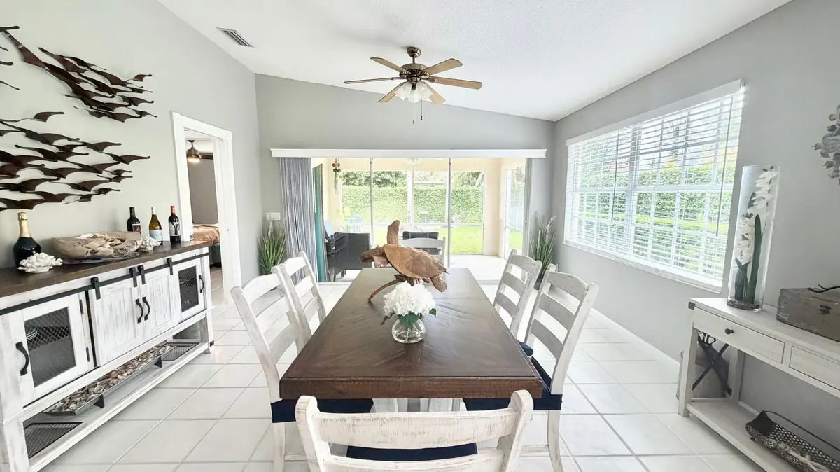 Dining Towards Lanai at 7145 Grassy Bay Drive, West Palm Beach