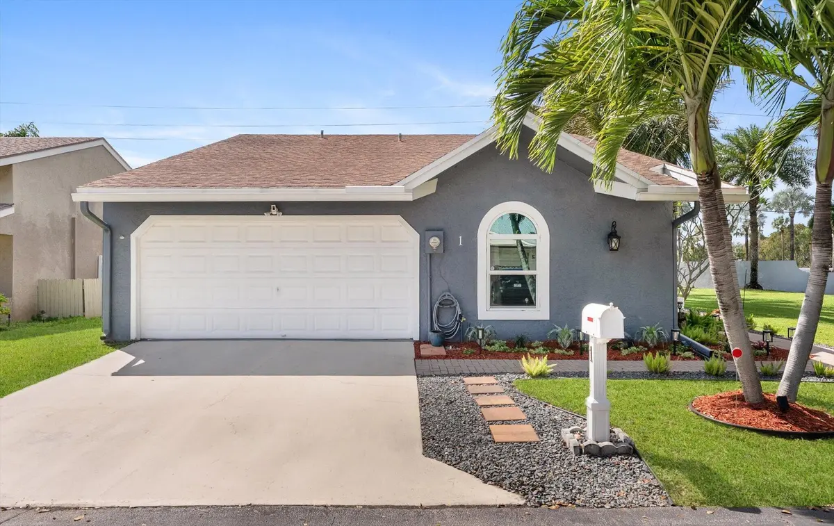 Front View Garage at 1 Hawthorne Lane, Boynton Beach