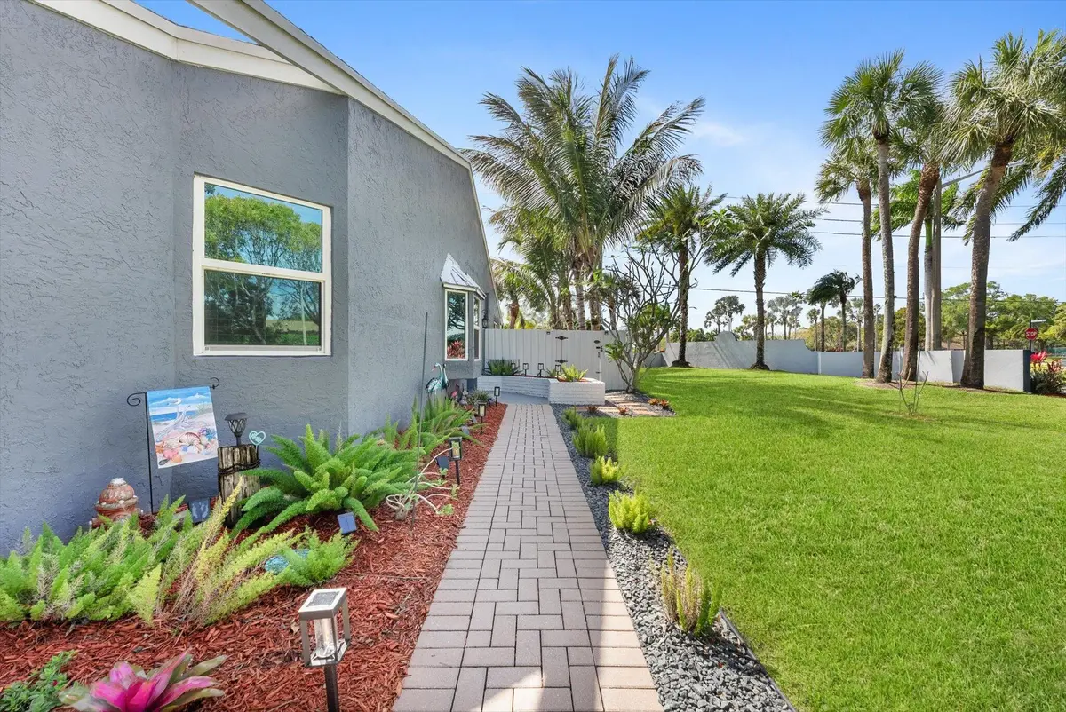 Walkway to Entry at 1 Hawthorne Lane, Boynton Beach