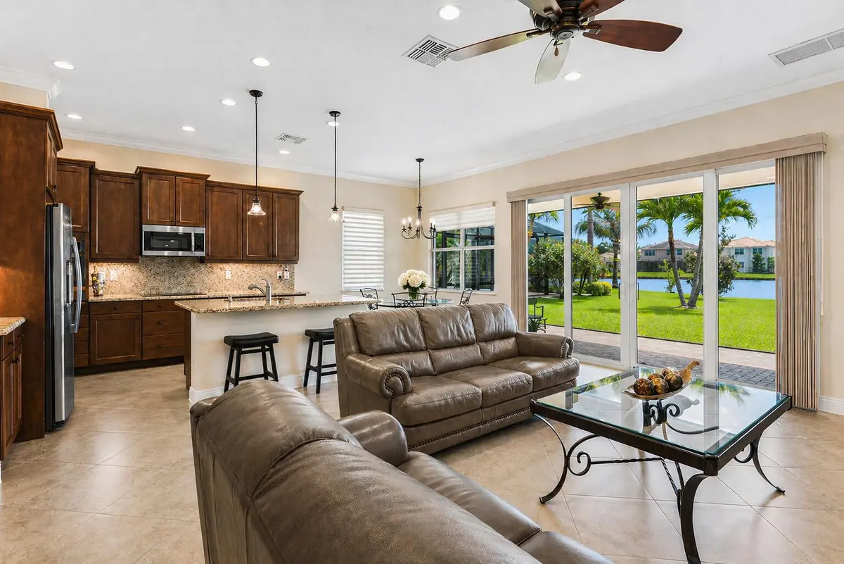 Open Living & Kitchen Area at 3028 Strada Court, Royal Palm Beach
