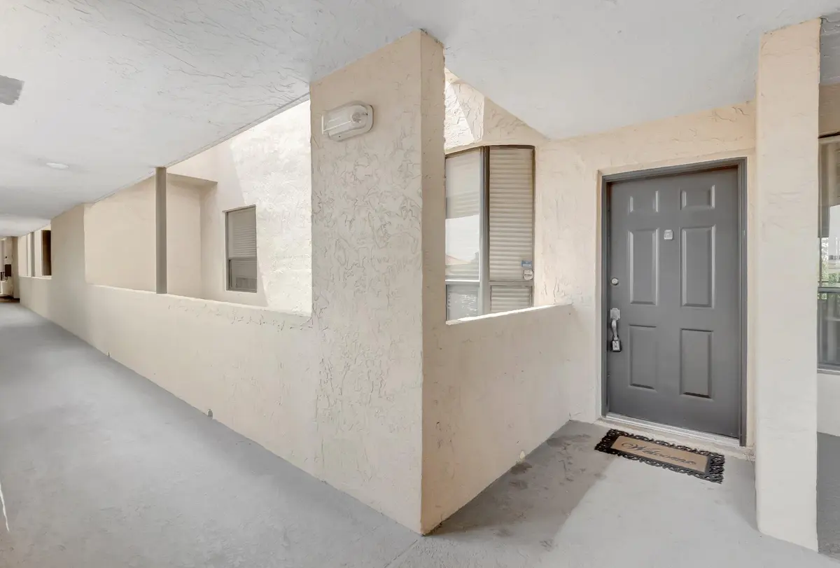 Front door at 7472 La Paz Boulevard 302, Boca Raton