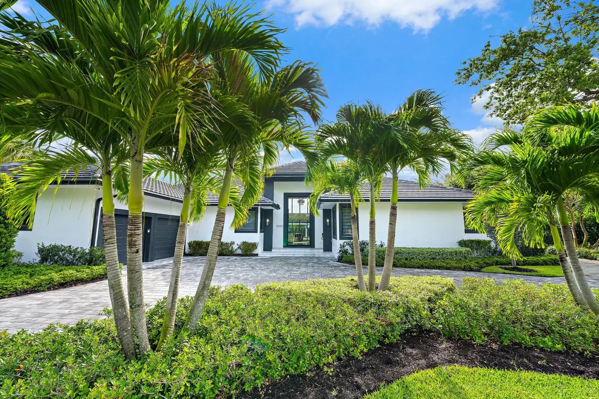 House front straight closer at 13220 Sabal Chase, Palm Beach Gardens