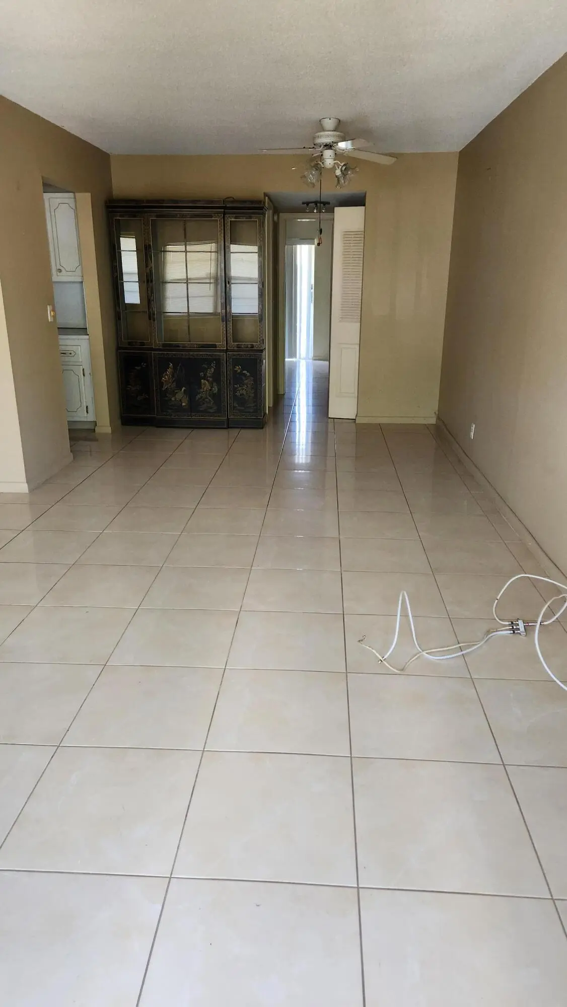 Dining area tile floors at 102 Andover D, West Palm Beach