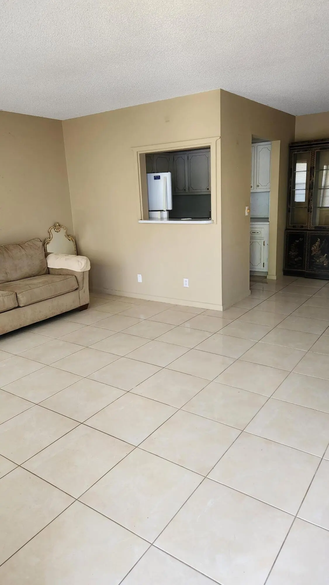 Living Room Tile Floors at 102 Andover D, West Palm Beach