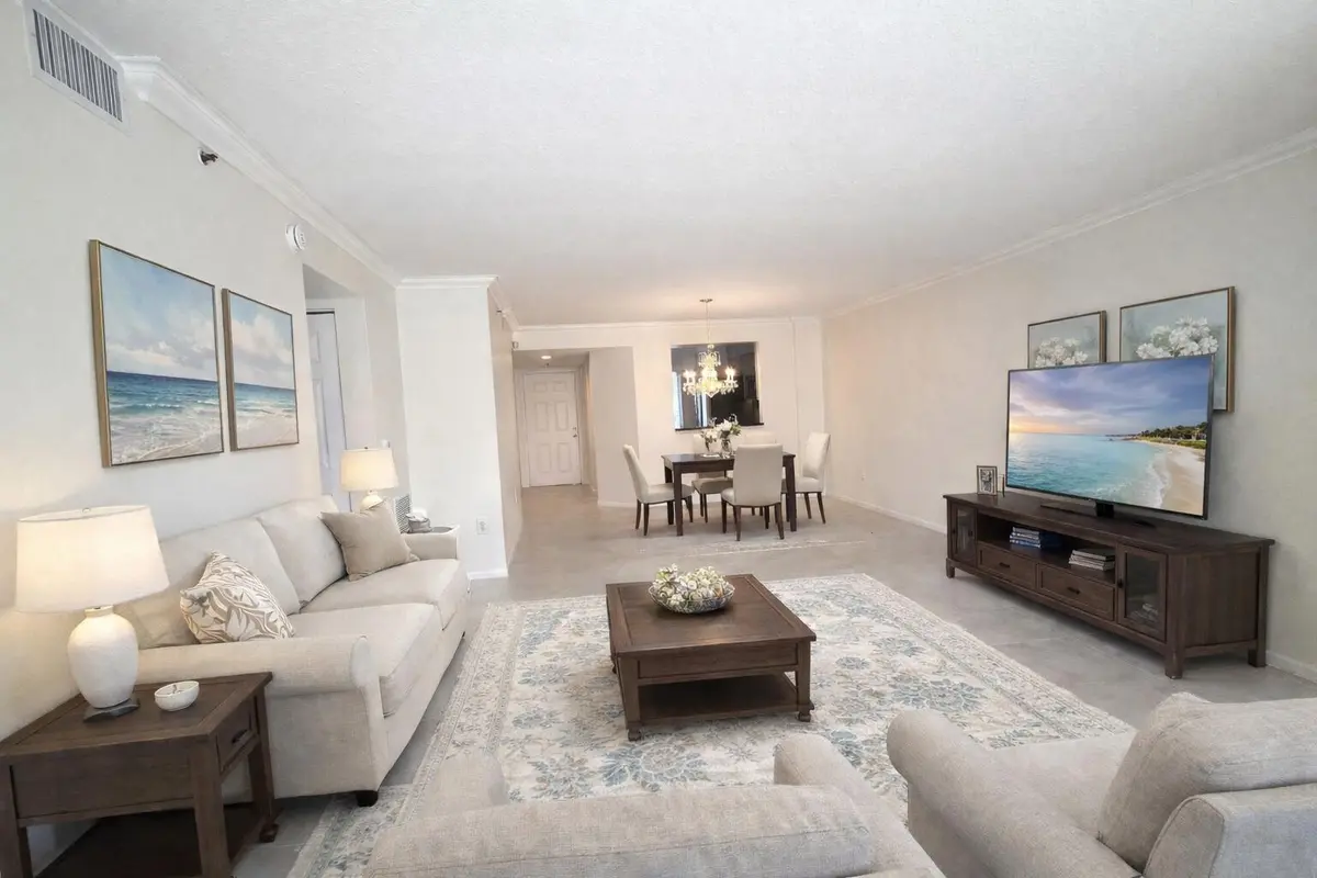 Modern condo living and dining space at 5777 Gemstone Court 207, Boynton Beach
