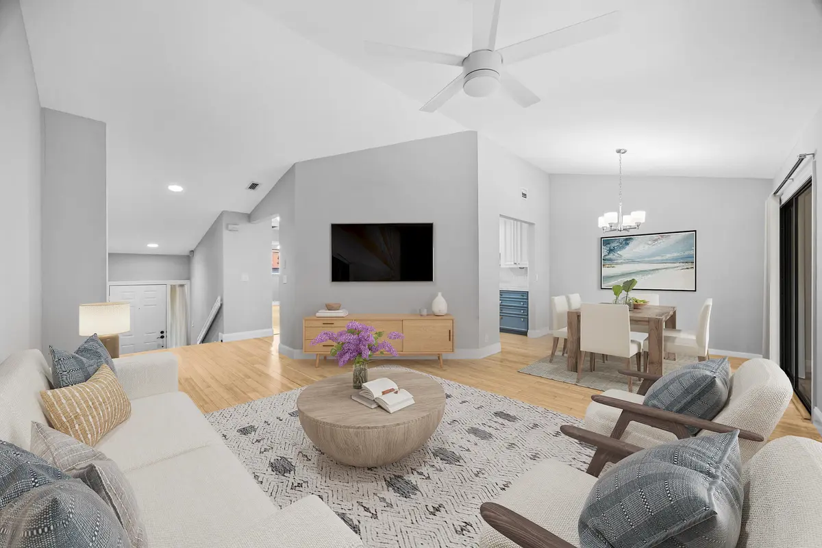Virtually Staged Living Room at 25 Lexington Lane F, Palm Beach Gardens