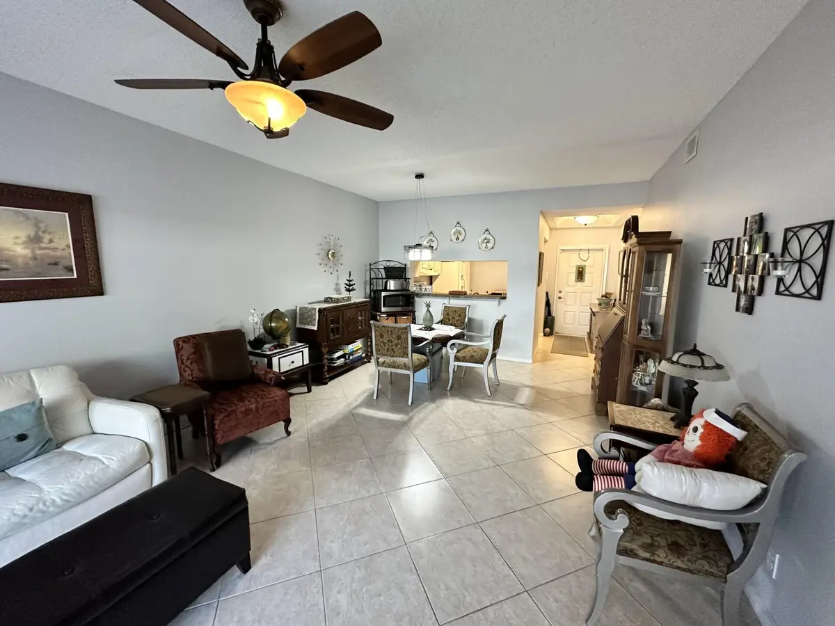 Living Room/ Entry Way at 101 Cypress Point Drive 101, Palm Beach Gardens