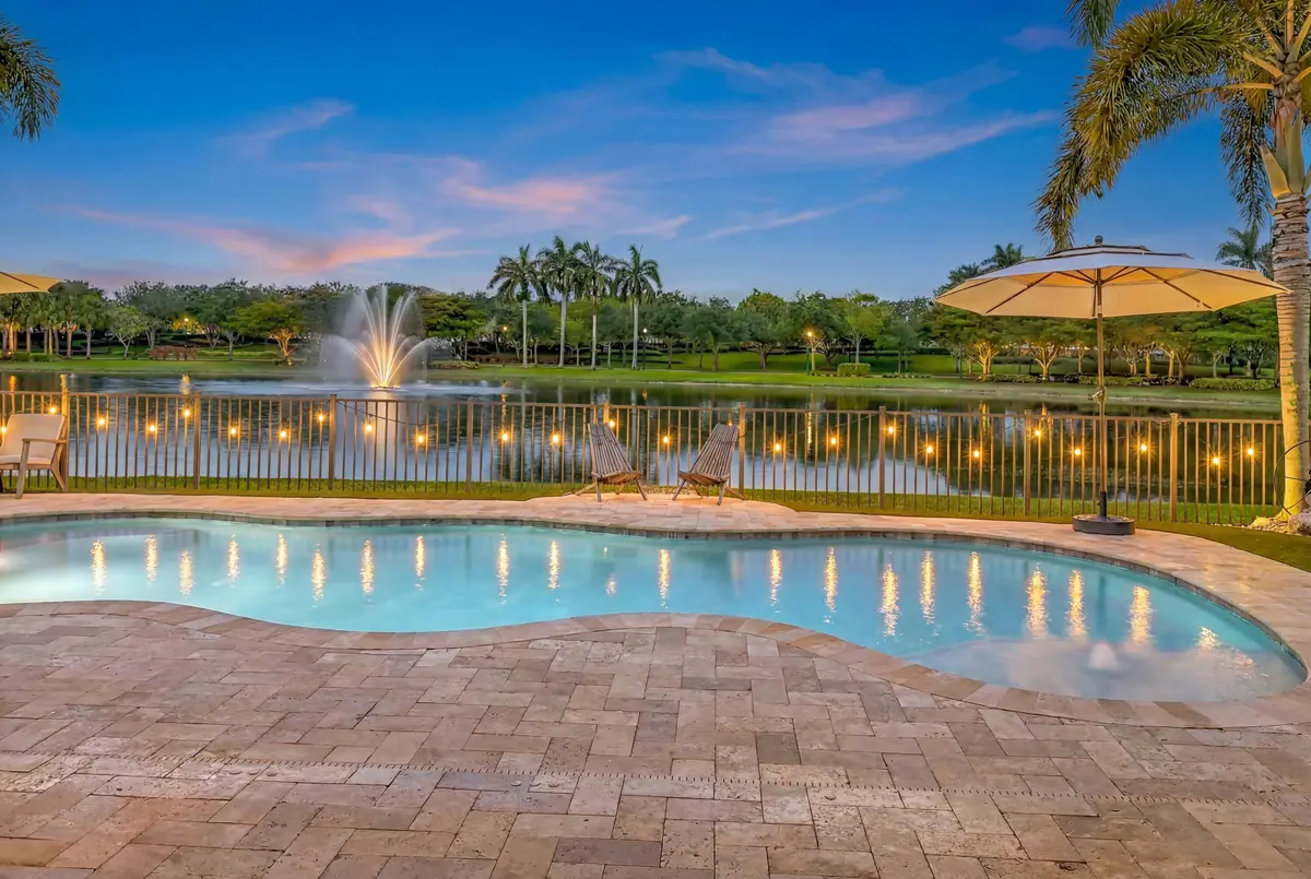 Pool-Lake Twilight at 2821 Bellarosa Circle, Royal Palm Beach