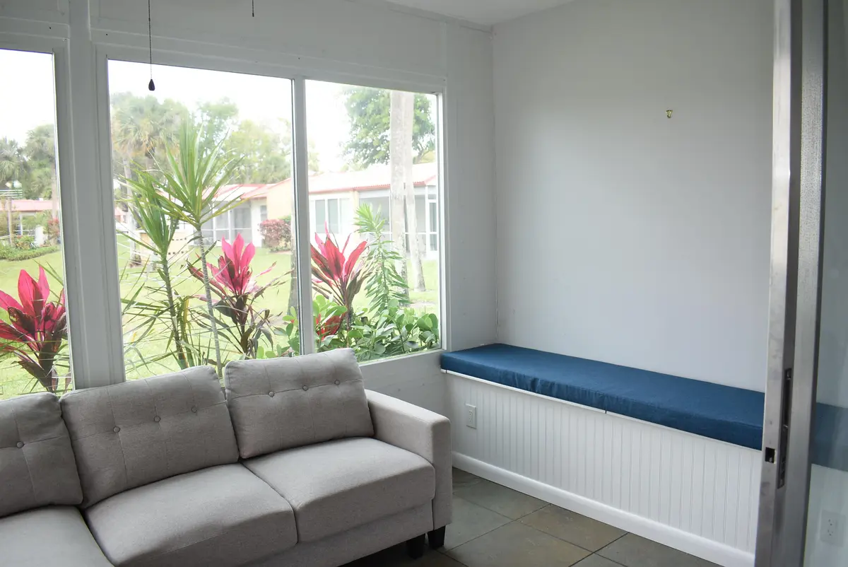 Florida Room with impact windows at 117 Golden River Drive, West Palm Beach