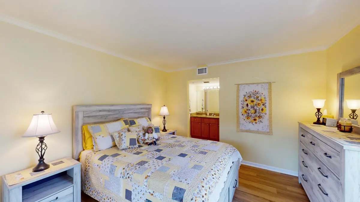Master bedroom at 5540 Tamberlane Circle 121, Palm Beach Gardens