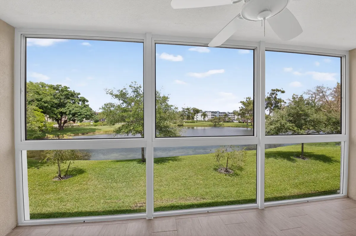 Tranquil Lake & Tree View From Patio at 2047 Newcastle C, Boca Raton