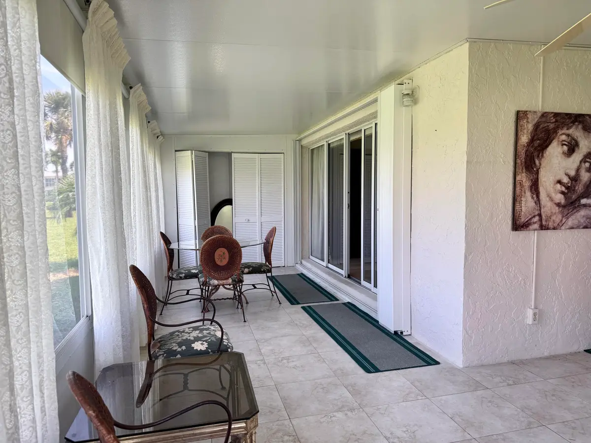 ENCLOSED PORCH at 1460 NW 19th Terrace 71-a, Delray Beach
