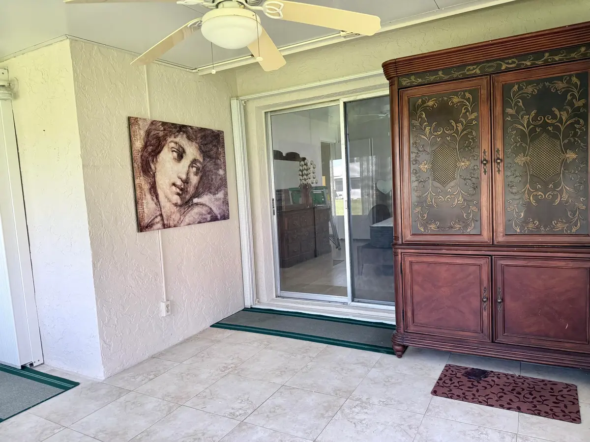 ENCLOSED PORCH at 1460 NW 19th Terrace 71-a, Delray Beach