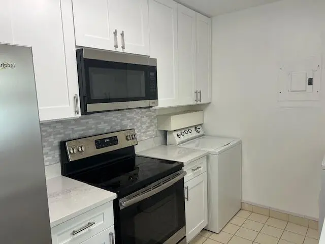 KITCHEN MIROWAVE CABINETS at 1032 NW 83 Avenue D58, Plantation