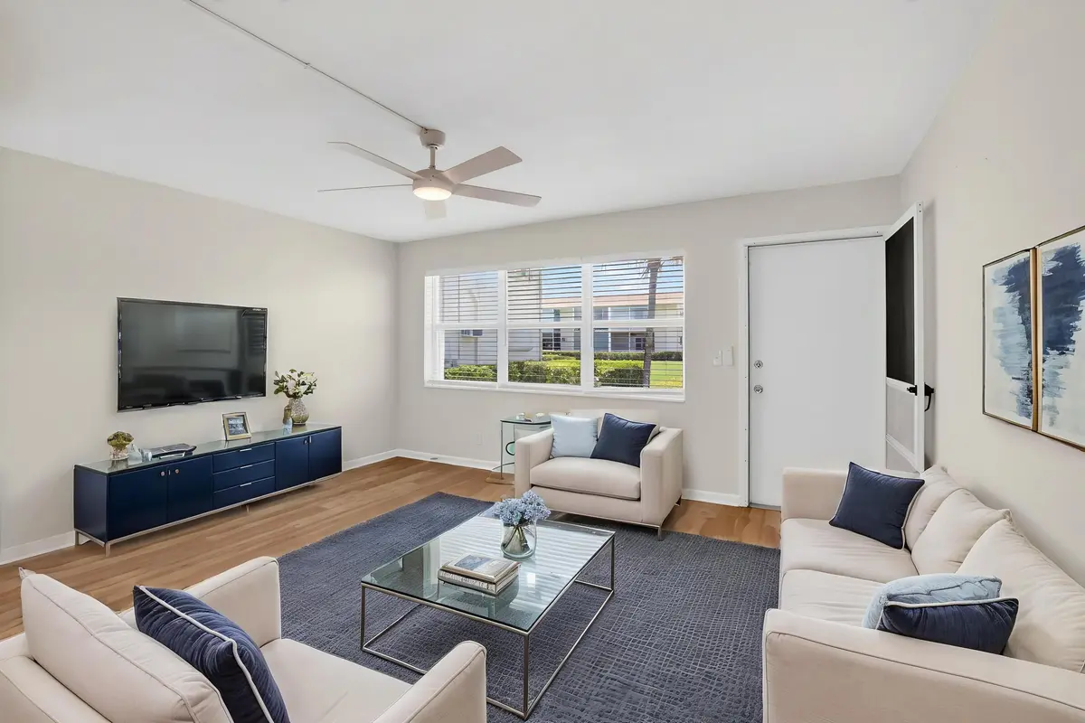 Living Room Virtually Staged at 660 Horizon 107, Boynton Beach