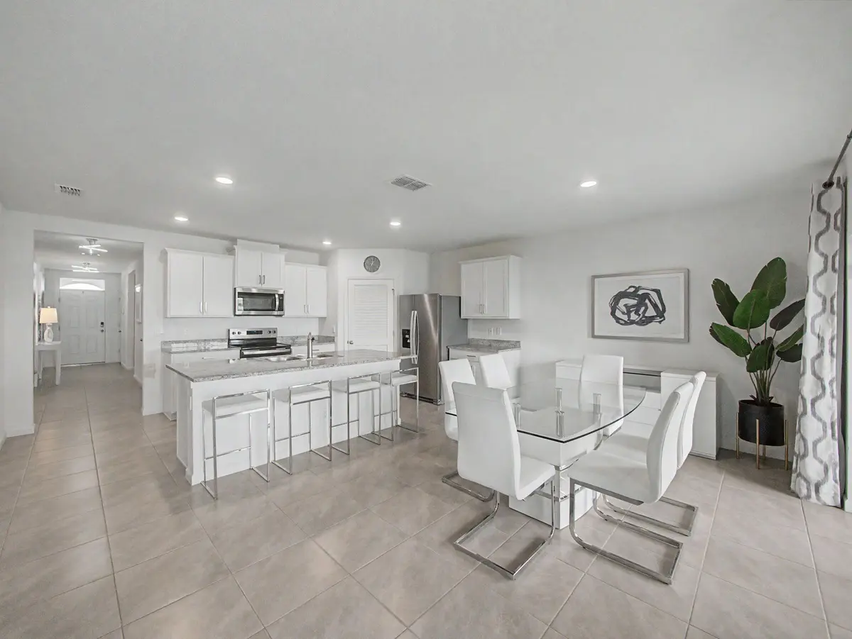 Dining & Kitchen at 9868 SW Triton Way, Port St. Lucie