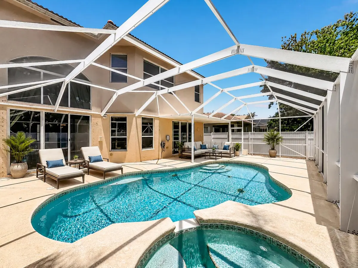 Digitally Staged with Pool Furniture at 5747 Sunberry Circle, Fort Pierce