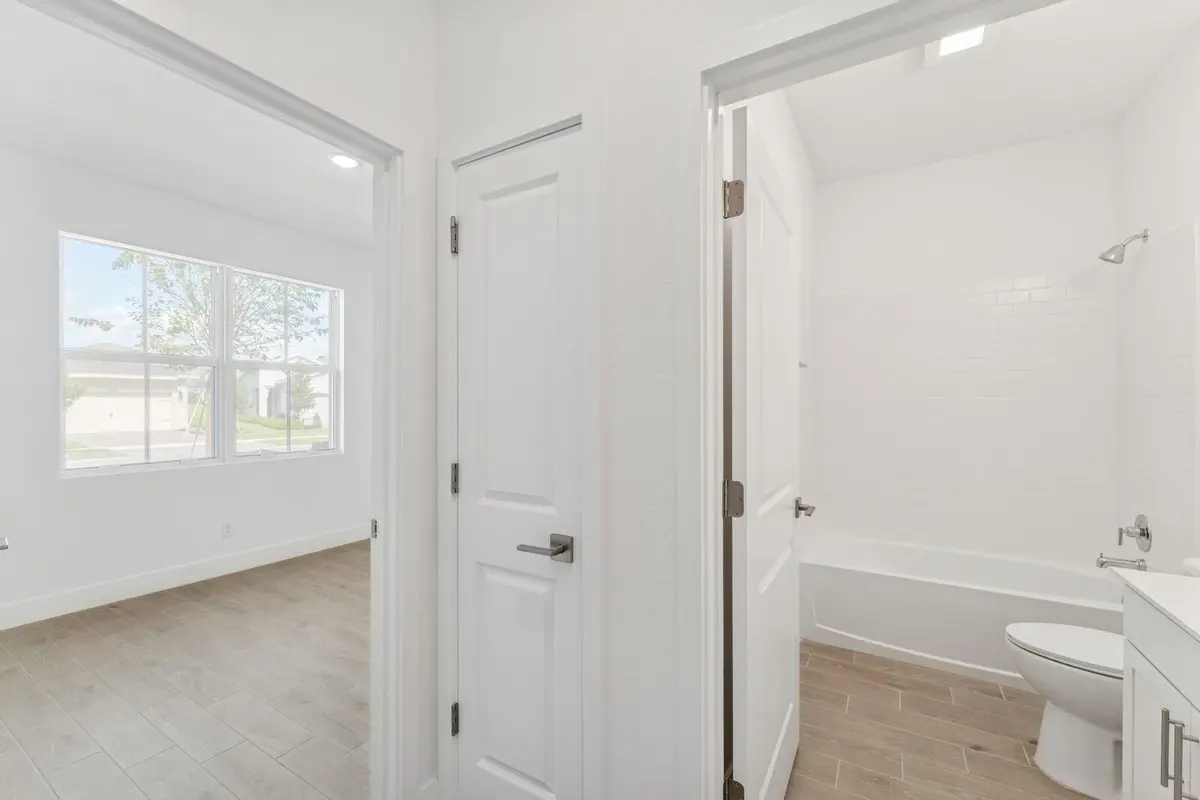 Entry to Bedroom 2 & Hall Bath at 10128 NW Field Flower Trail, Port St. Lucie