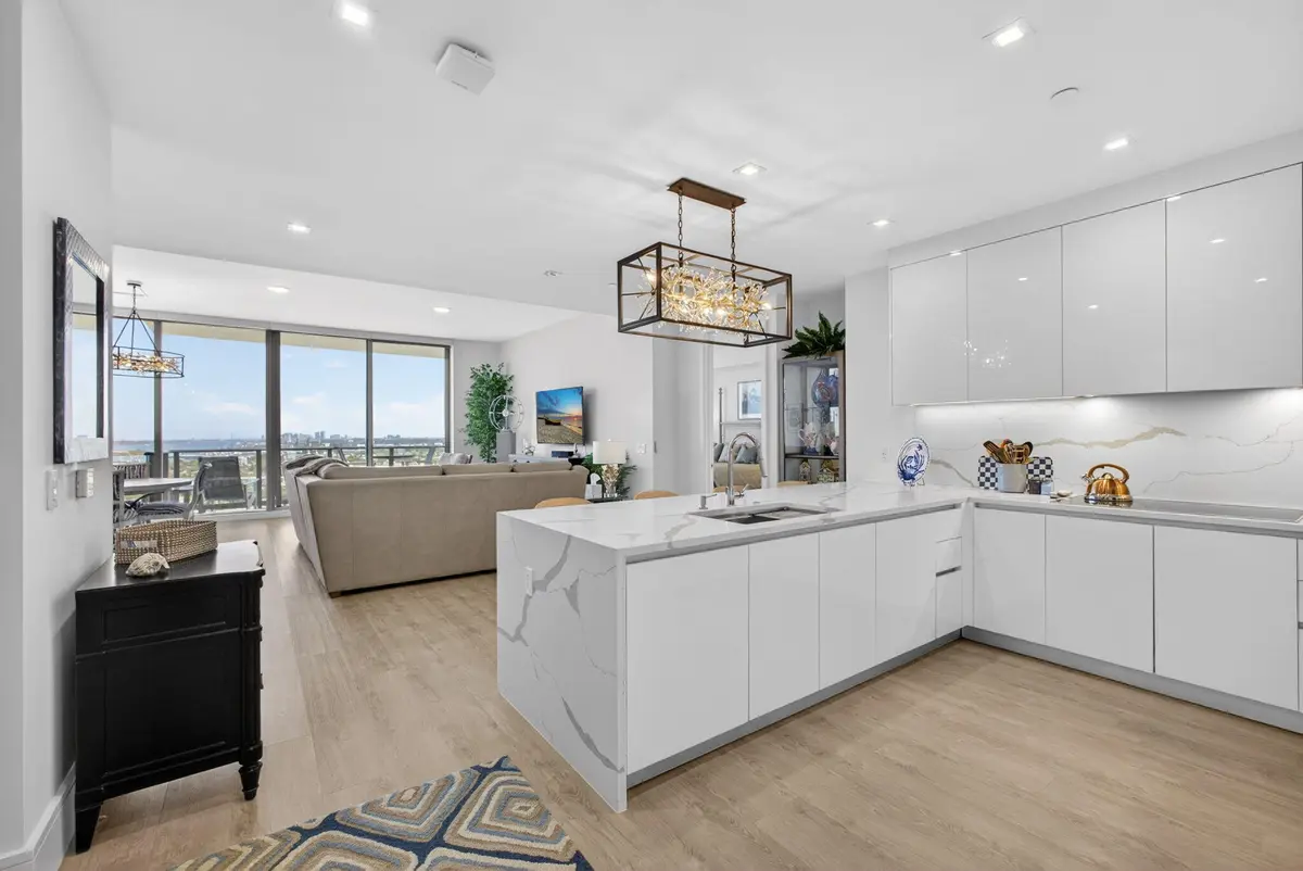 Kitchen into Living Room at 220 Lake Shore Drive 1907, West Palm Beach