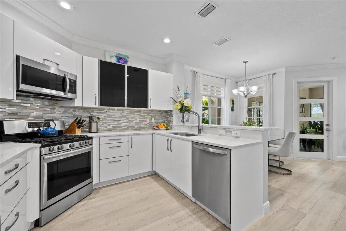 Open Modern Kitchen at 181 Evergrene Parkway 14-b, Palm Beach Gardens