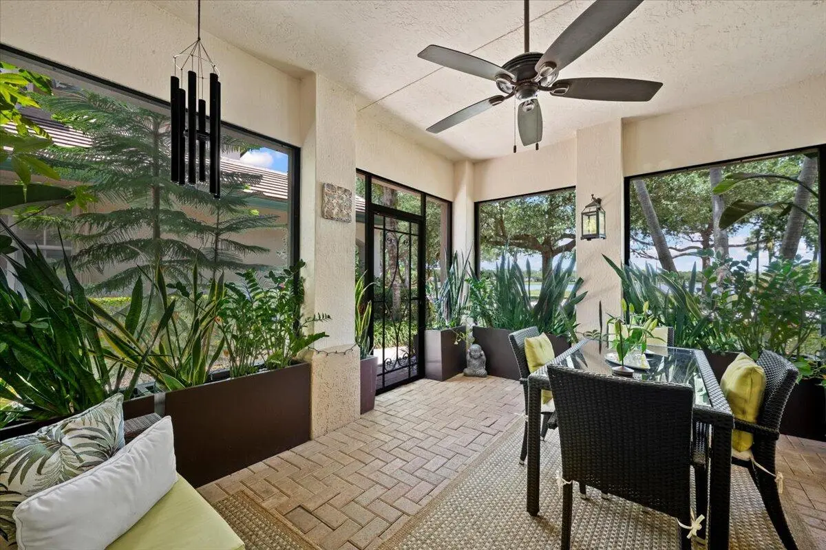 Screened-In Extended Front Porch / Patio at 181 Evergrene Parkway 14-b, Palm Beach Gardens