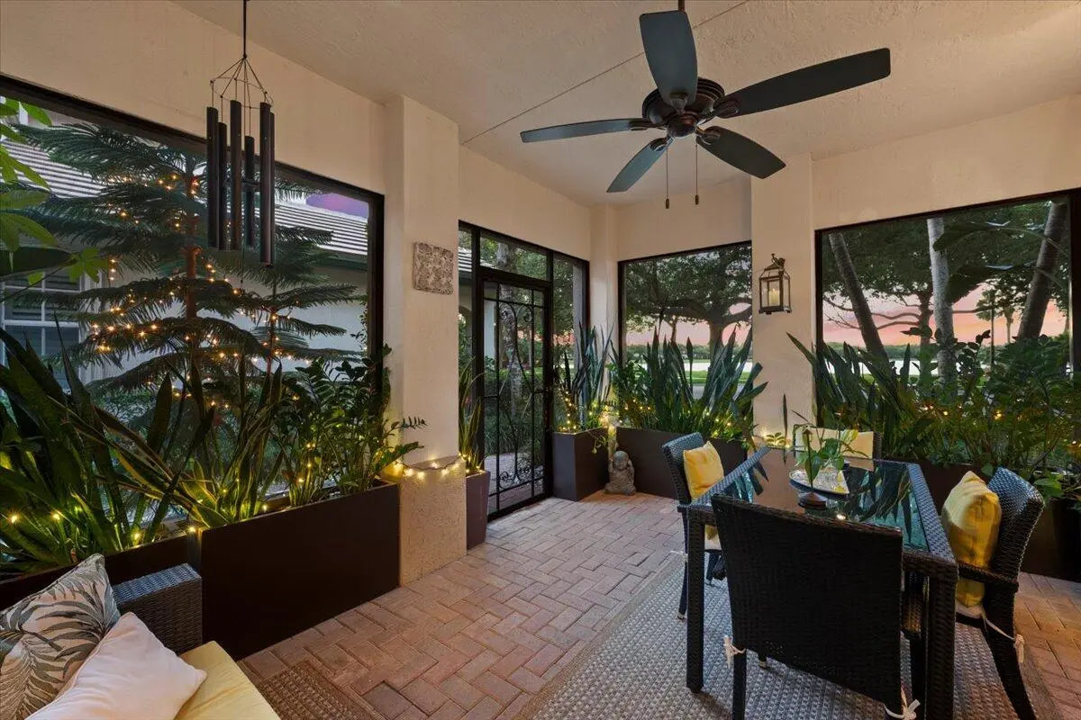 Screened-In Extended Front Porch / Patio at 181 Evergrene Parkway 14-b, Palm Beach Gardens