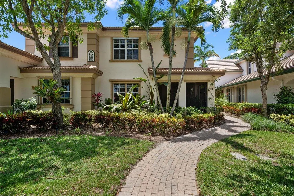 Inviting Pathway Entrance at 181 Evergrene Parkway 14-b, Palm Beach Gardens