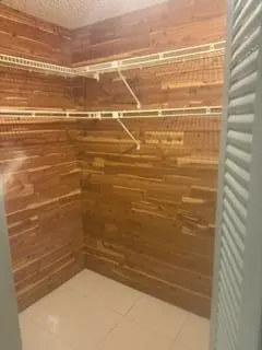 Primary closet at 14798 Summersong Lane, Delray Beach