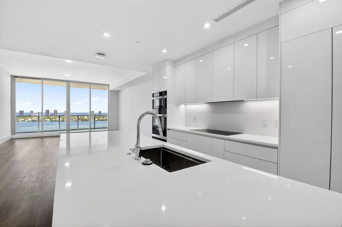 Kitchen and living area at 220 Lake Shore Drive 1808, West Palm Beach