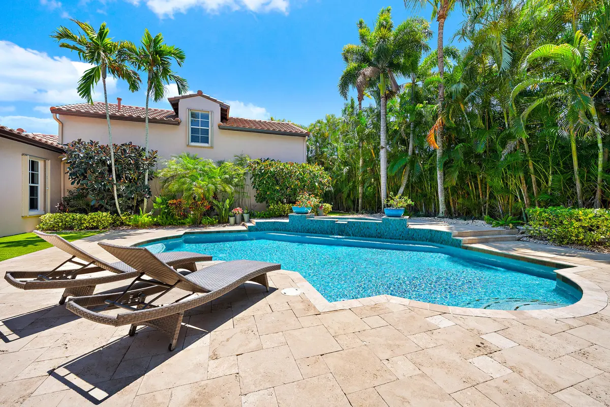 Swimming Pool & Rear Exterior at 105 Segovia Way, Jupiter