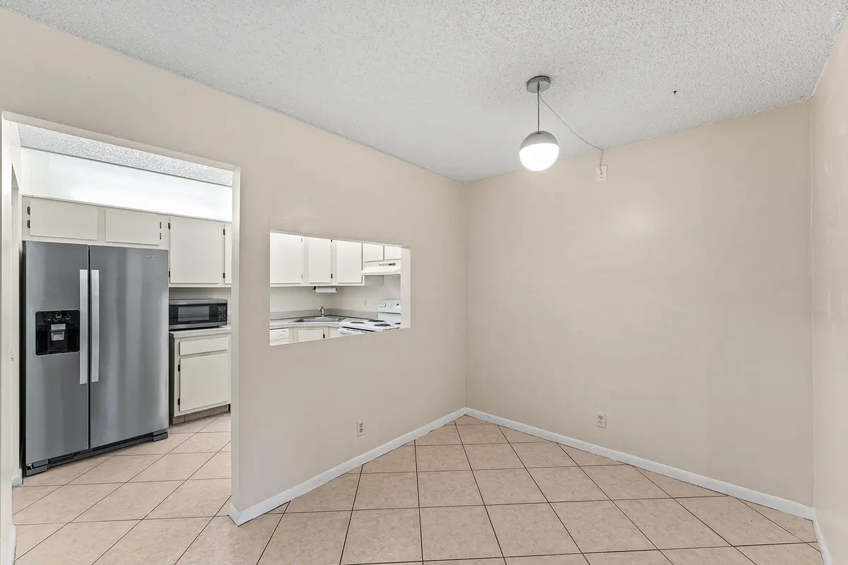 Dining Room at 509 Shady Pine Way C1, Greenacres