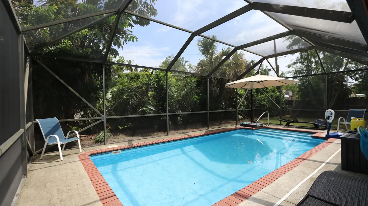 REFRESHING SCREENED POOL! at 3169 Nautical Way, Lantana