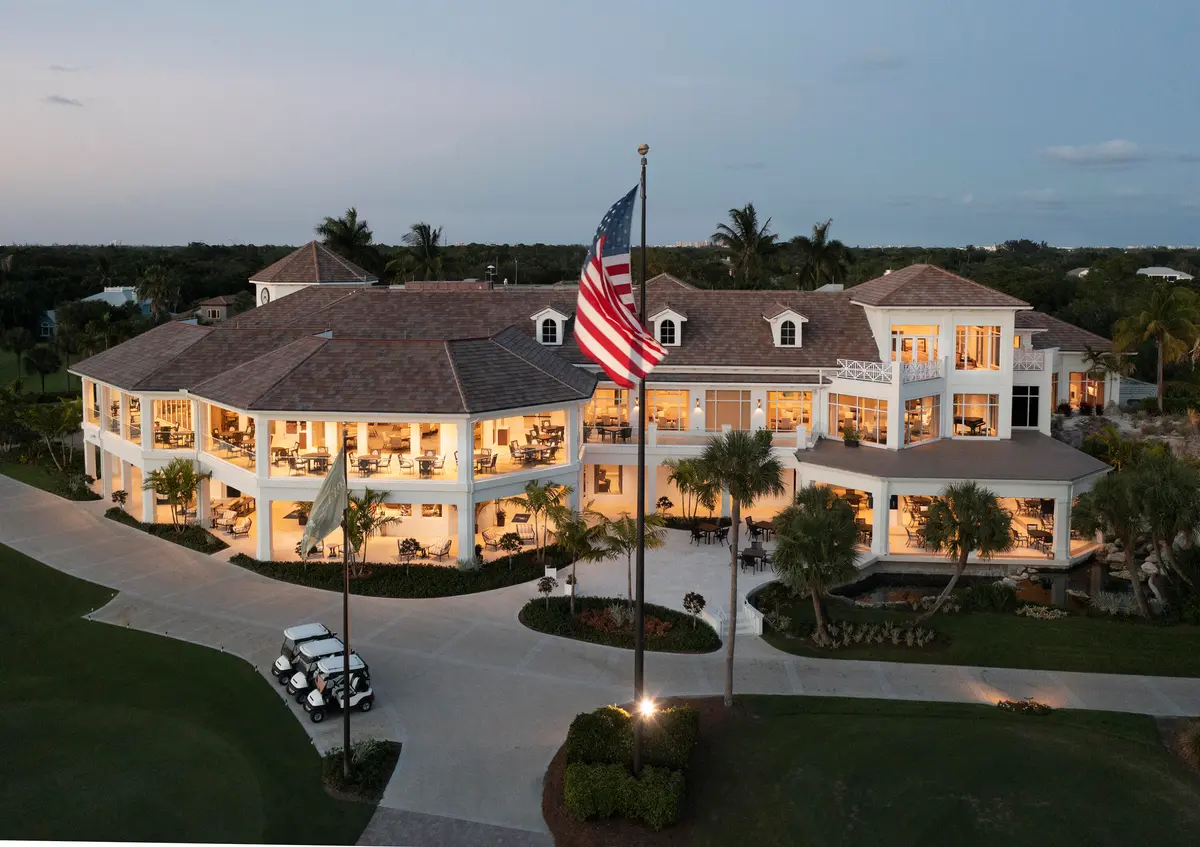 Clubhouse Back with Flag. FAV at 111 Caballo Lane, Jupiter
