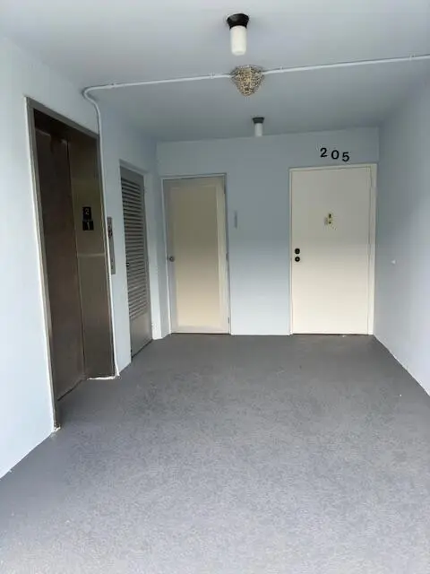 Front Door near elevator and laundry at 2018 S Federal Highway 205, Boynton Beach