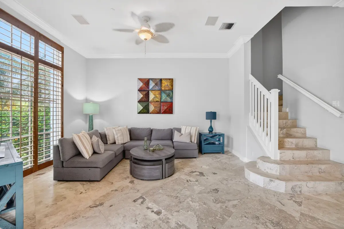 Family Room with Plantaion Shutters at 2860 Marina Circle, Lighthouse Point