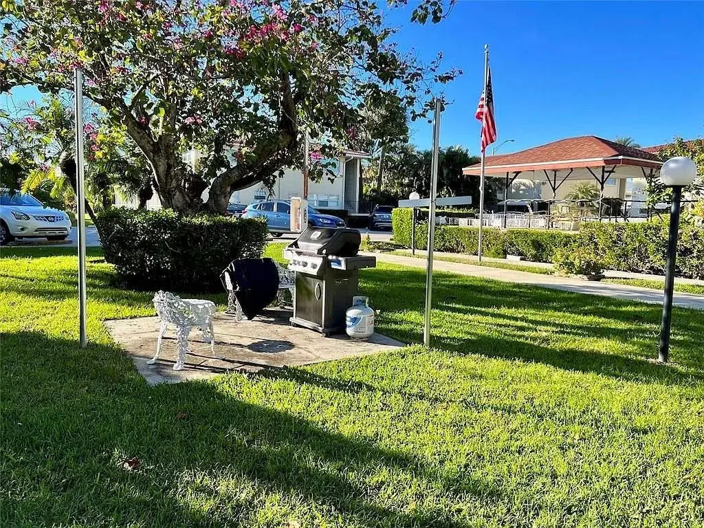 Courtyard w Barbeque -Patio View at 2202 NE 36th Street 15, Lighthouse Point