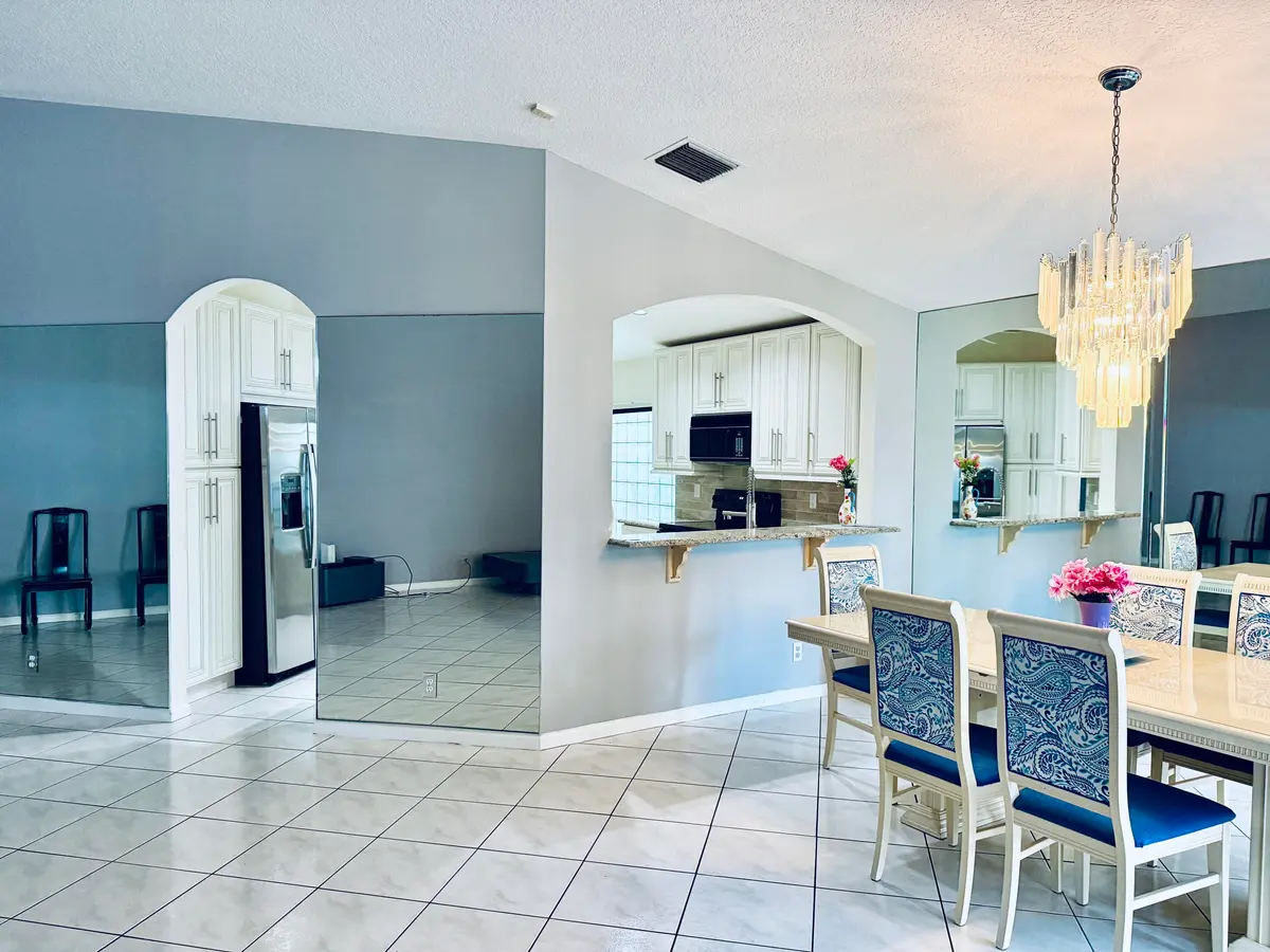 Dining/Kitchen Doorway at 10921 Royal Caribbean Circle, Boynton Beach