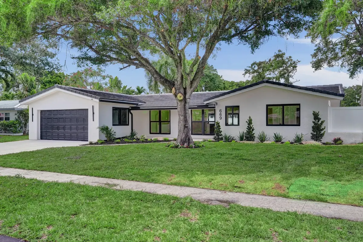 MLS_01_exterior_grass_patch_fixed_HIGH_R at 669 SW 3rd Street, Boca Raton