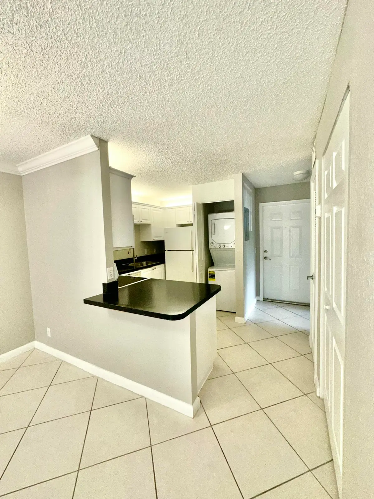 Kitchen / Entrance at 4120 Union Square Boulevard B2, Palm Beach Gardens