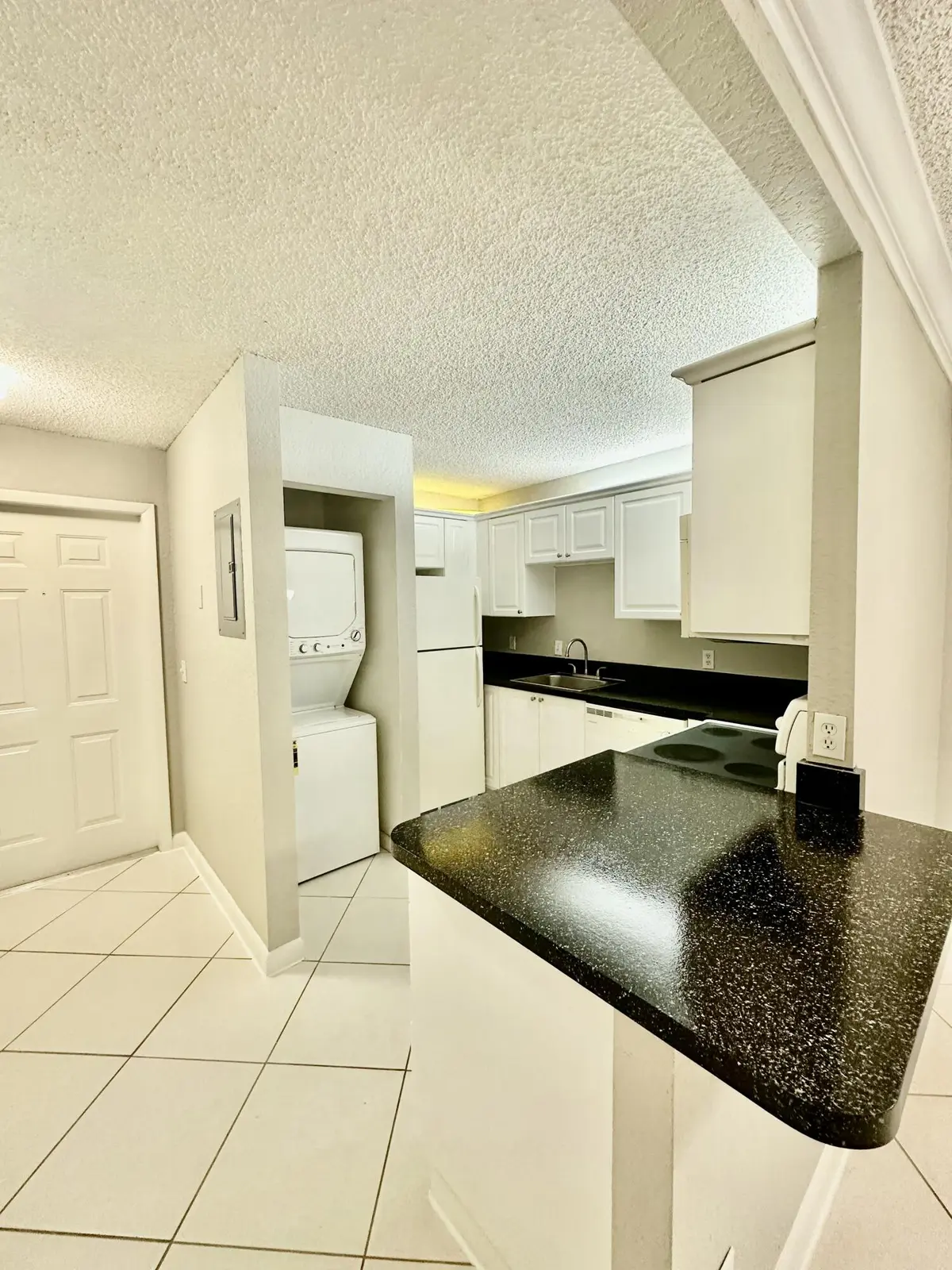 Kitchen / Laundry at 4120 Union Square Boulevard A2, Palm Beach Gardens