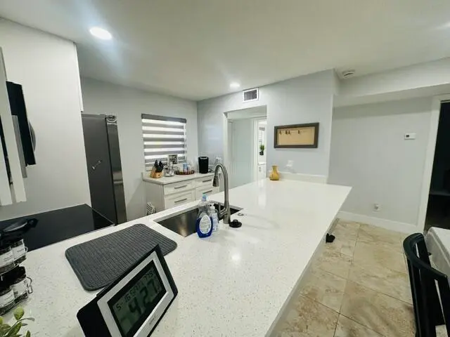 kitchen at 2601 NE 3rd Court 105, Boynton Beach