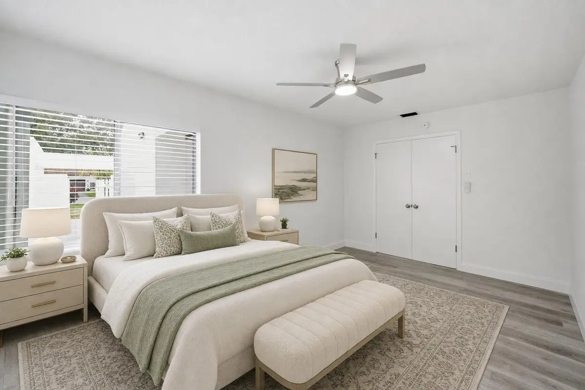 Guest Bedroom to Entry-staged at 905 NW 22nd Avenue, Delray Beach