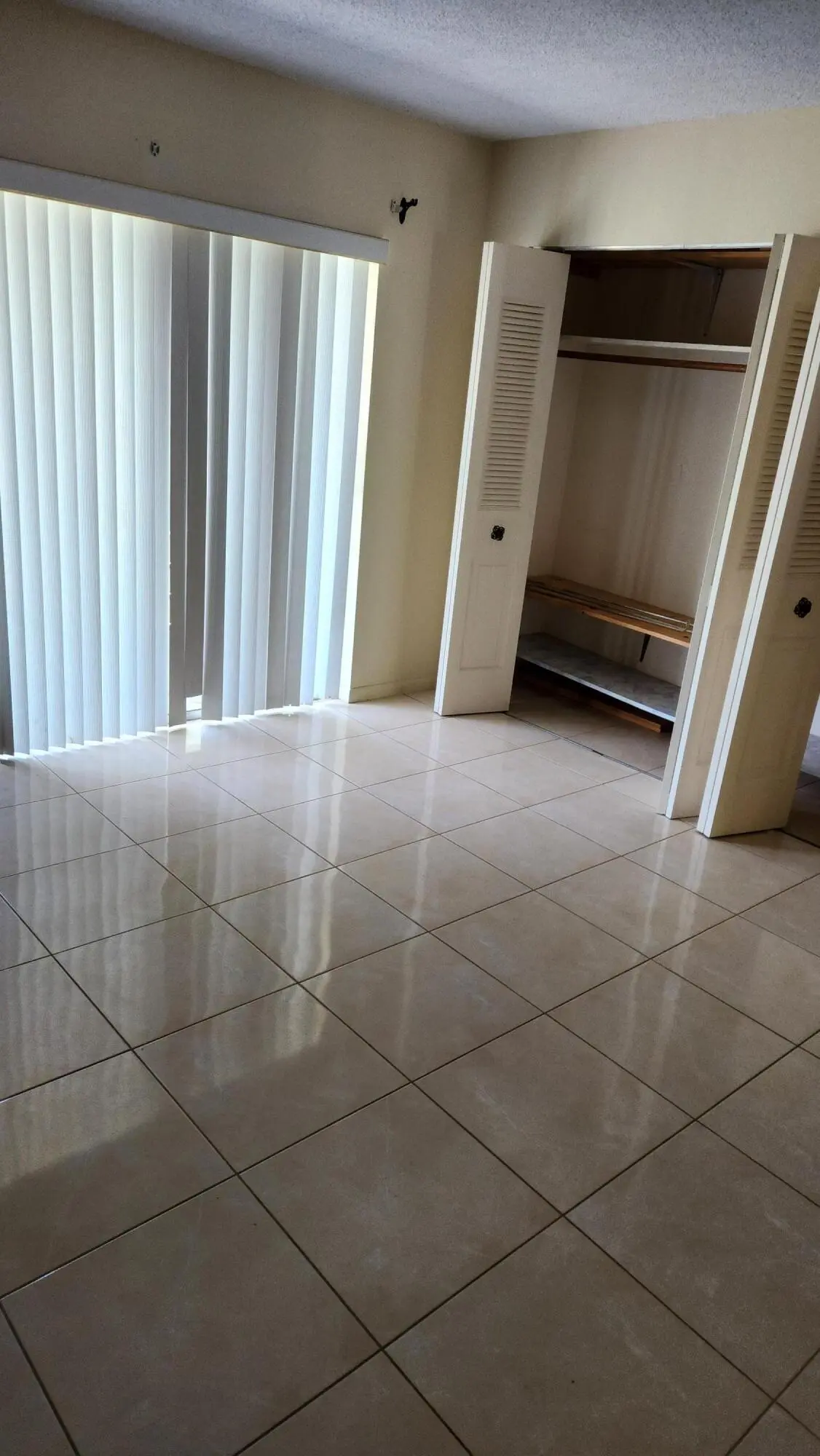 Bedroom tile floor at 102 Andover D, West Palm Beach